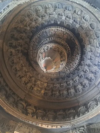 Looking up at the magnificent domed ceiling of the Somanathapura temple, a kaleidoscope of stone carvings.