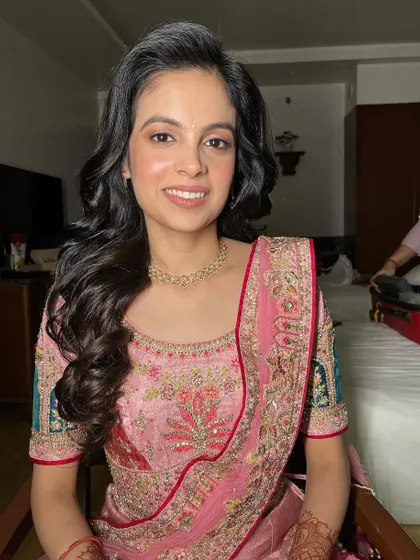 A happy and confident bride. Her smile at the end of the process said it all, and she looked absolutely radiant in her soft pink outfit.