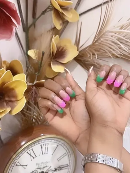 This angle showcases the sharp, clean lines of our modern French manicure, even with bright and unconventional colors.