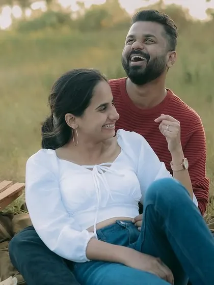 A burst of genuine laughter during a casual pre-wedding picnic. These are the memories I strive to preserve.