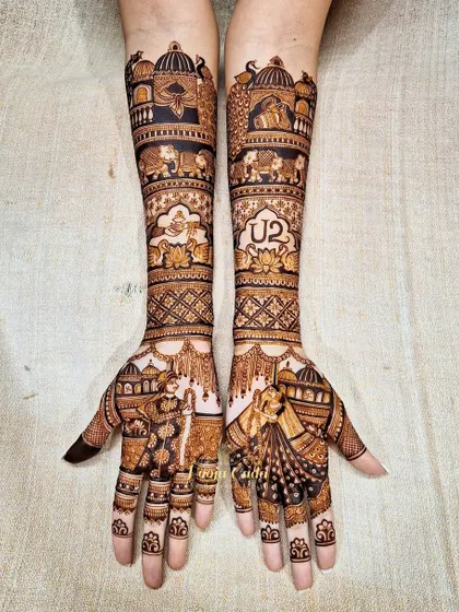 A beautiful bridal design incorporating the couple's love for the band U2, alongside traditional bride and groom figures.