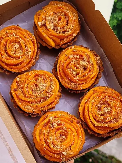 My mango tarts are to die for. They have a buttery, crispy pastry, a creamy crème pâtissière, fresh mango puree, and are topped with mango rosettes and crunchy almonds.