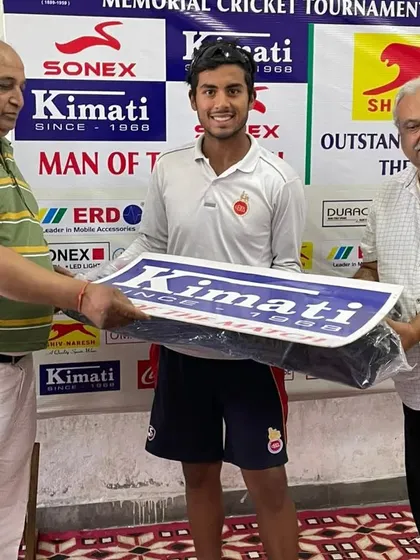 One of our players receiving the 'Man of the Match' award in a memorial cricket tournament. Individual accolades like these are a direct result of the discipline and skill development emphasized in our coaching camps.