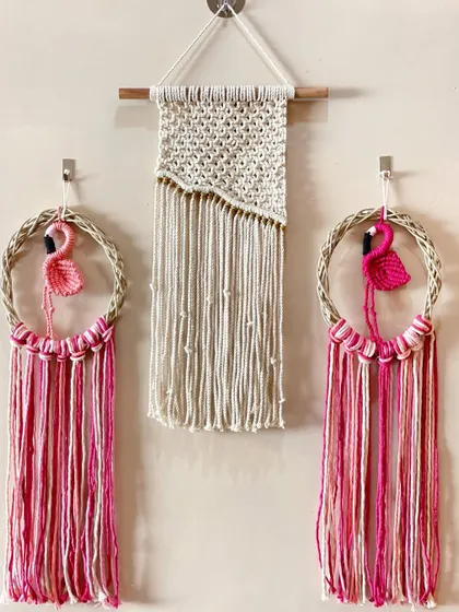 This wall arrangement features a pair of my flamingo dreamcatchers alongside a simple, elegant wall hanging. The pink tones create a fun and coordinated theme.