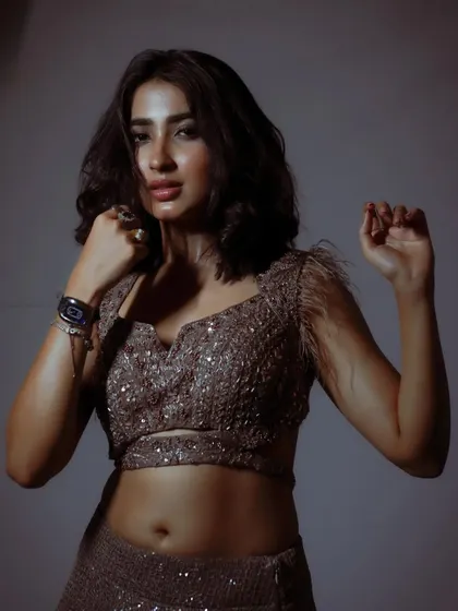 A powerful and confident portrait of an actress. The simple styling and clean background put all the focus on her expression.