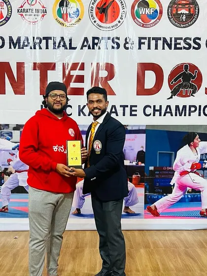 Presenting an award to a guest at our Inter-Dojo championship event.