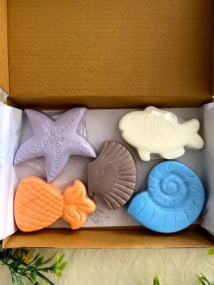 Along with festive themes, I also offer other kids' hampers, like this sea animals set. This box of five ocean-themed soaps is a great gift for any time of year.