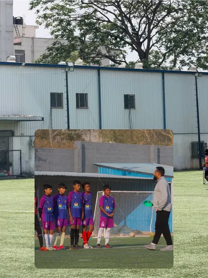 A coach walks the line, observing and instructing players. We believe in hands-on guidance to ensure every player is learning and improving.