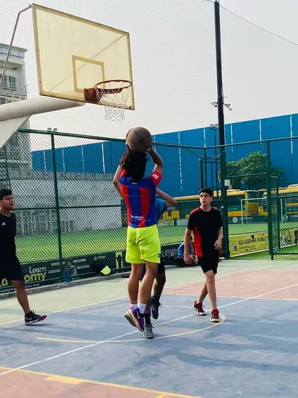 Players battle for position under the hoop, a common scenario in our game-play drills.