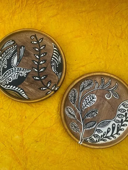 The same plates against a vibrant yellow background, showing how they can be styled to create a bright and cheerful effect.