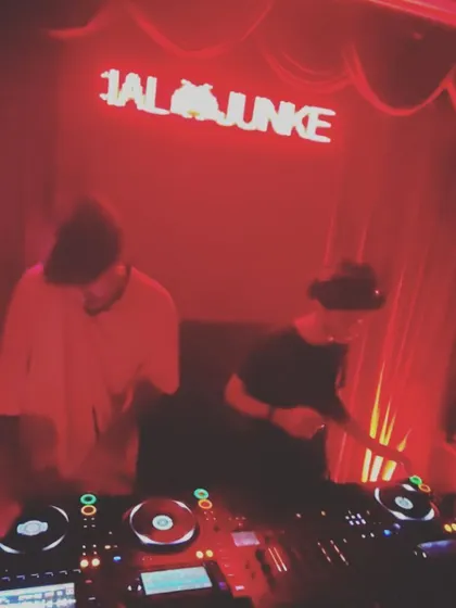 A shot of me and another DJ at the Arcade 140 event.
