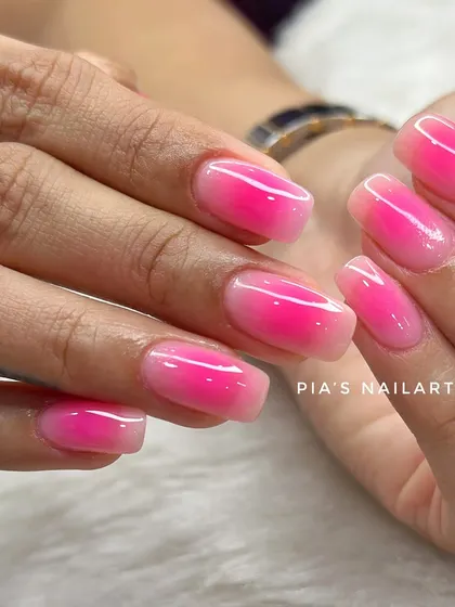 Pink aura magic on natural nails. This shows how we can achieve the trendy airbrushed look even on shorter nails.