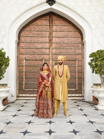 This is the beginning of everything. I love creating these grand, royal portraits that feel both timeless and powerful, capturing the couple against a backdrop that is as magnificent as their love story.