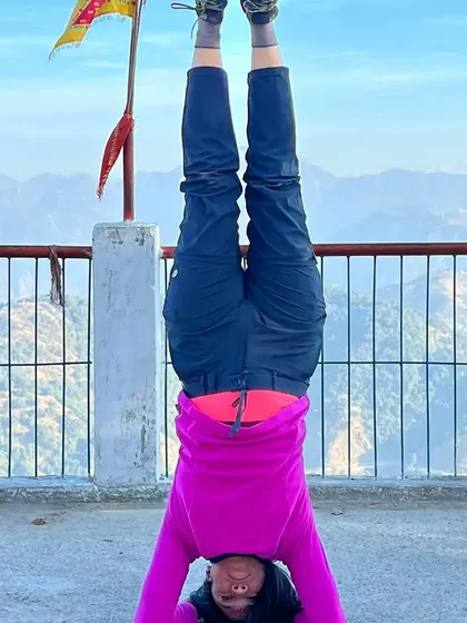 My Sirsasana practice in the crisp mountain air of Rishikesh, a powerful way to gain a new perspective.