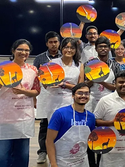 The whole team from our LinkedIn clock painting workshop proudly showing off their creations. Each clock is unique, but they all came together for a great group photo.