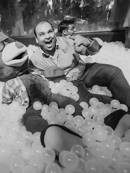Laughter and joy fill the air as guests of all ages enjoy the ball pool at our Toy Room Club themed after-party, creating delightful, candid moments.
