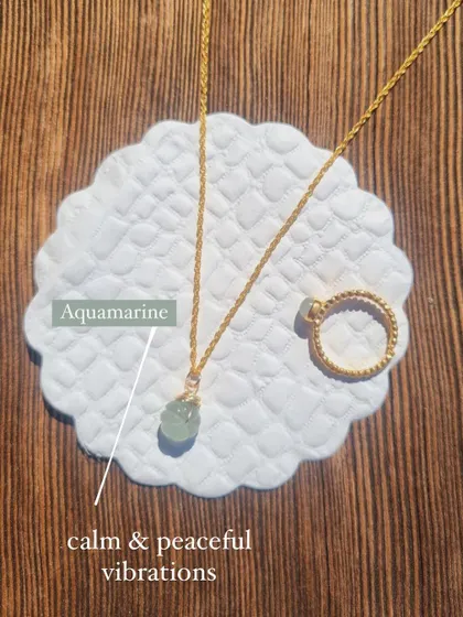 Another view of the Aquamarine Melon Pendant and ring set, perfect for anyone who needs more calm in their life.