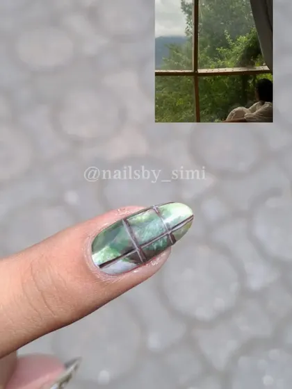 This nail art was inspired by a peaceful photo of someone looking out a window at a lush green view. I tried to capture that calm, serene feeling.