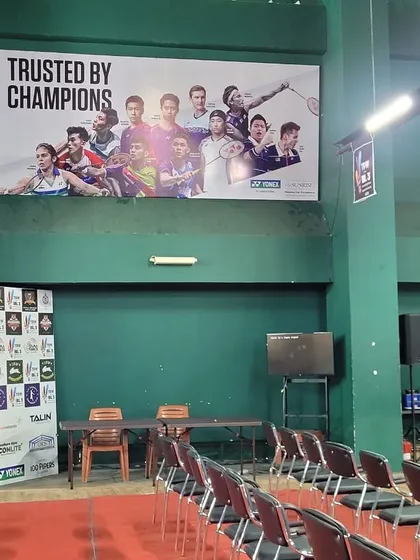 Our academy is trusted by champions. This banner on our wall reminds every player of the level they are aiming for.