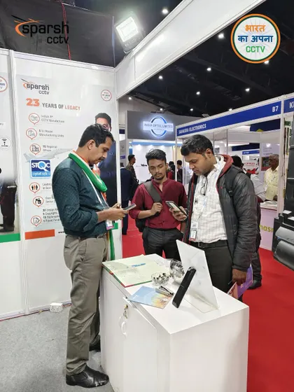 Visitors at SES 2025 using their phones to learn more about my products. Integrating digital tools like QR codes helps me share information effectively at busy events.