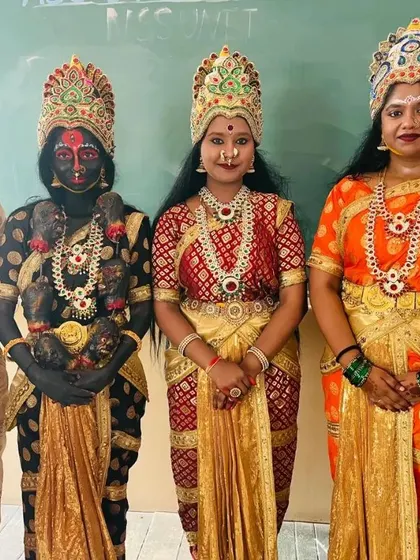 A full lineup of performers I prepared for a cultural event. This showcases my ability to create a variety of goddess looks, including Lakshmi and Kali, that work together as a cohesive group.