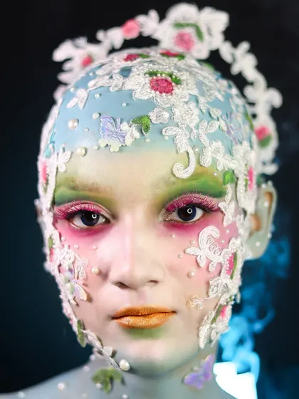 An incredibly detailed look using lace and floral appliqués to create a delicate, porcelain-like effect.