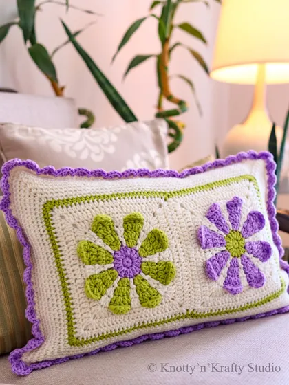 Another look at the vibrant floral cushion, a perfect piece to brighten up any living space.