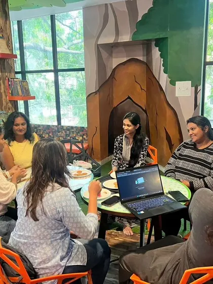 Our community events are a space for great conversations. Here, a group of moms are deep in discussion during our parenting expert session.