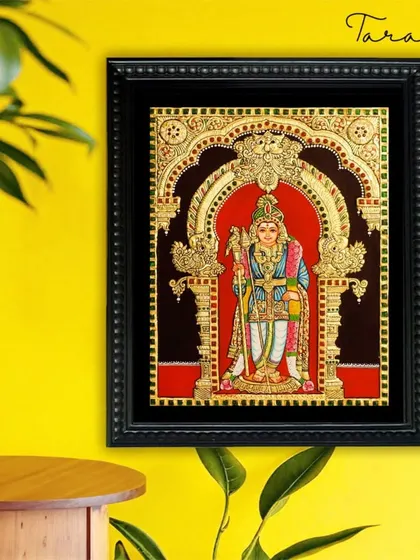 Our standing Lord Murugan Tanjore painting, shown in a home setting. The artwork's traditional aesthetic brings a sense of heritage and spiritual grounding to the modern space.
