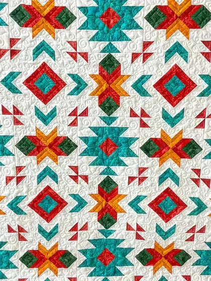 A close-up of the Southwestern geometric quilt, highlighting the intricate shapes and patterns.