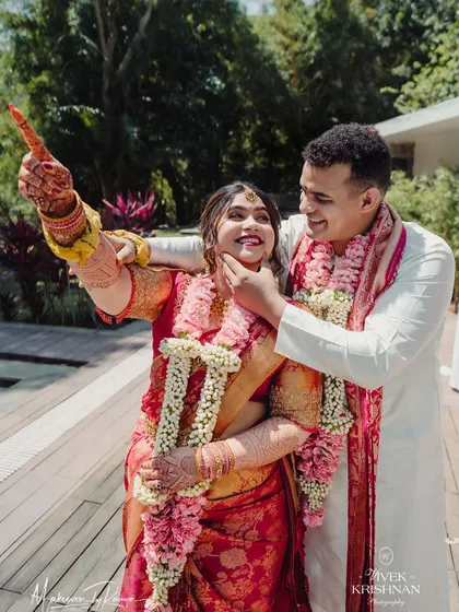 A fun, candid shot of the happy couple. My goal is to create makeup that not only looks beautiful but also allows you to be yourself and enjoy every second of your day.