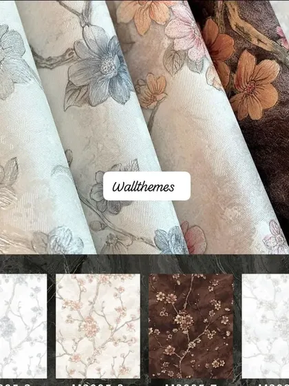 A collection of floral wallpaper rolls and a catalog view of the different color options available.