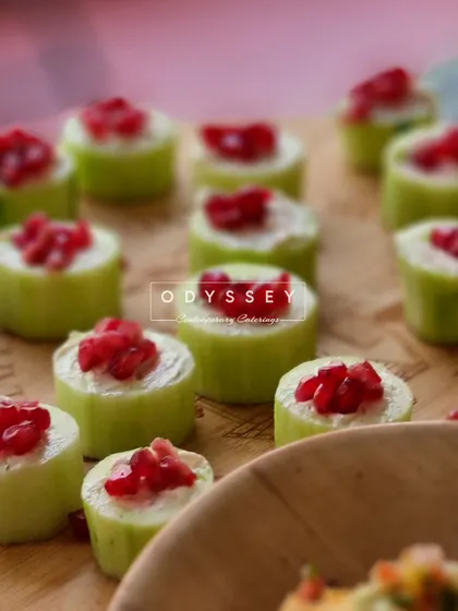 Our stuffed cucumber bites topped with pomegranate seeds are a light, healthy, and visually appealing appetizer. They provide a refreshing crunch and a burst of flavor.