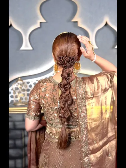 Another angle of the detailed braid, a true work of art that is perfect for a bride who wants a unique and memorable hairstyle.