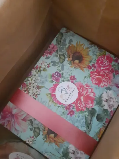 The joy of gifting is in the presentation. Here is one of my festive boxes, wrapped in beautiful floral paper and tied with a ribbon, ready to bring a smile to someone's face this Diwali.