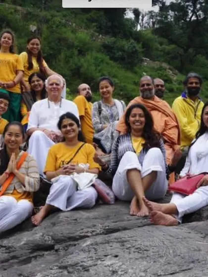 A joyful moment with students, resting together in nature. The bonds formed at the ashram create a global Sangha, a spiritual family that supports one another on this path.
