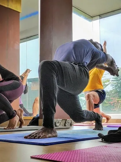 Focusing on the foundation. In this lunge, I'm holding my body, neck, and head in a straight line, a principle from the Bhagavad Gita for finding stability in meditation and in posture.