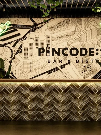 The concept design for the reception desk at Pincode 24 Bar & Bistro. This render established the first impression for guests, featuring a custom graphic mural, neon signage, and a textured tile front.