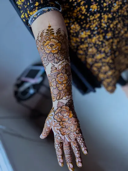 Another angle of my signature floral work, showing how the design wraps around the arm for a complete and immersive piece of art.