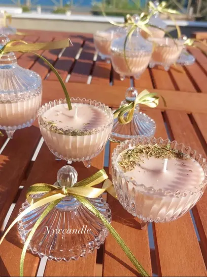 These beautiful crystal jar candles with dried herbs were part of a 500-piece order for a wedding. They add a touch of natural elegance.