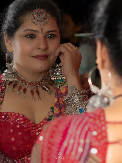 A close-up of the Navratri look, showing the detailed silver maang tikka and jhumkas that complete the traditional Garba style.