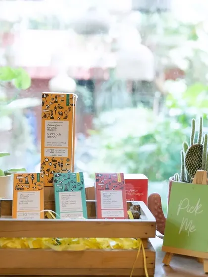 Little details make all the difference. I have a curated selection of products available for you to "pick me" and try, set against a backdrop of lush greenery.