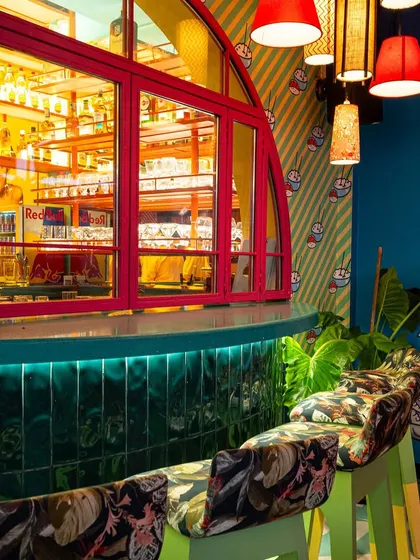 A detail shot of the curved bar and custom-upholstered stools at The Fatty Bao. I focus on these unique design elements to showcase the thought and personality that went into the decor.