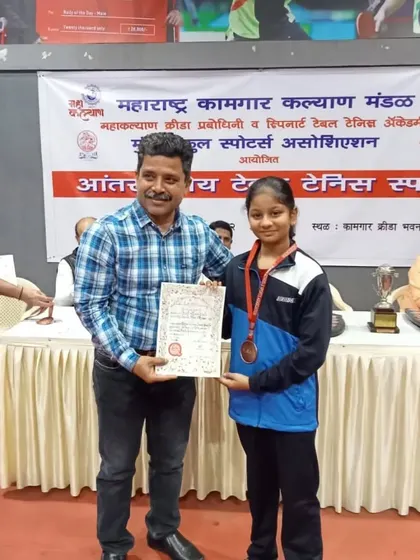 Ananya Chande receiving her U-16 girls' title at an inter-school tournament. Her success at school-level competitions is just as important to us.