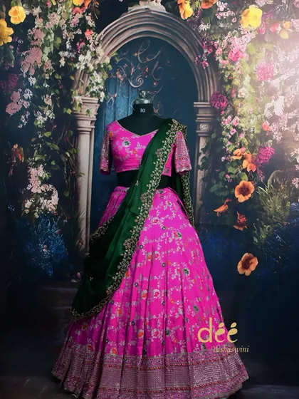 My collection isn't just about gowns. I also offer a wide range of traditional Indian wear for rent, like this beautiful pink floral lehenga with a contrasting green dupatta, perfect for weddings or festive events.
