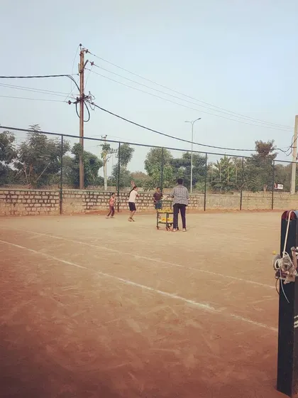 Another perspective of a group coaching session, highlighting the ample space available for drills.