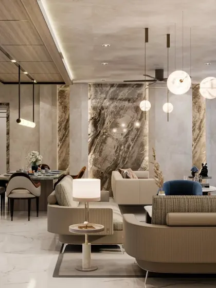 An overview of the open-plan living and dining room, highlighting the use of dramatic marble cladding and spherical pendant lights. The layout is designed to feel both grand for entertaining and comfortable for daily life.