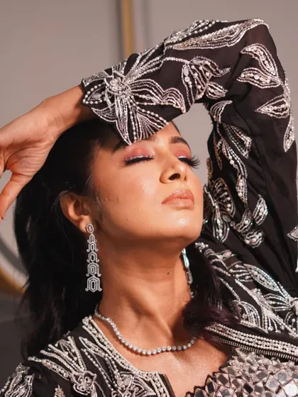 A creative pose showing off the beautiful blend of the eyeshadow. The seamless transition of colors on the eyelid is a technique I teach in my advanced classes.