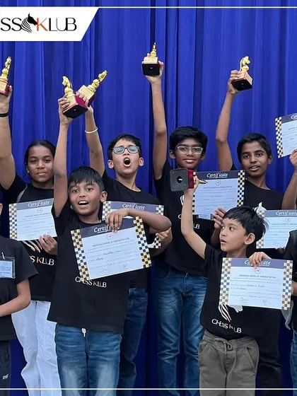 The thrill of victory! Our students proudly display their trophies and certificates after a spectacular performance at the Universal First Age Category Children Chess Tournament. We love seeing our champions shine.