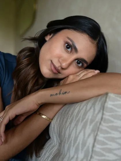 Building trust with the person in front of my lens is key. It allows for intimate and honest portraits like this one, capturing a quiet confidence that draws the viewer in.